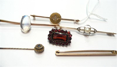 Lot 80 - A diamond set bar brooch, three bar brooches, a stick pin and a garnet brooch