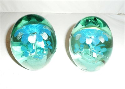 Lot 90 - A pair of Victorian blue and green glass dumps
