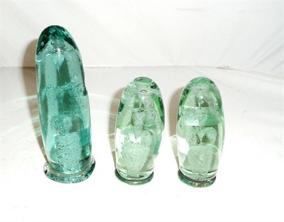 Lot 95 - Three green glass dump paperweights