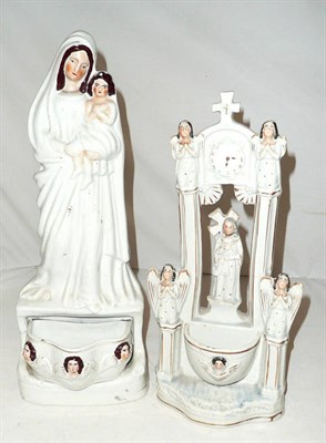 Lot 118 - Two Staffordshire pottery biblical figural groups with water holders