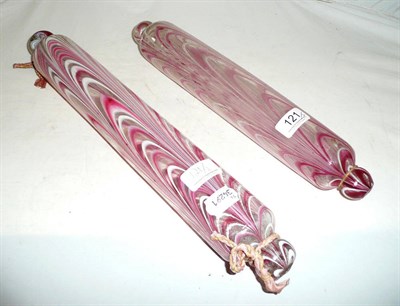 Lot 121 - Two Victorian pink and white trailed glass rolling pins