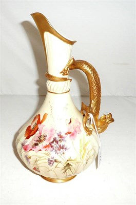 Lot 122 - A Royal Worcester jug with lizard handle, shape no 1463, decorated with flowers