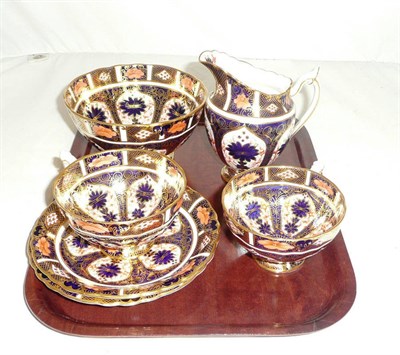Lot 131 - Two Royal Crown Derby Imari pattern teacups and saucers, sugar bowl and cream jug, pattern 9021