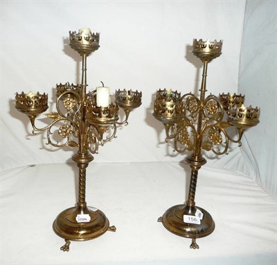 Lot 156 - Pair of brass four branch five light candelabrum