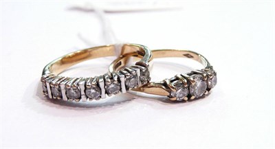 Lot 172 - A 9ct gold diamond three stone ring and a 9ct gold half eternity ring