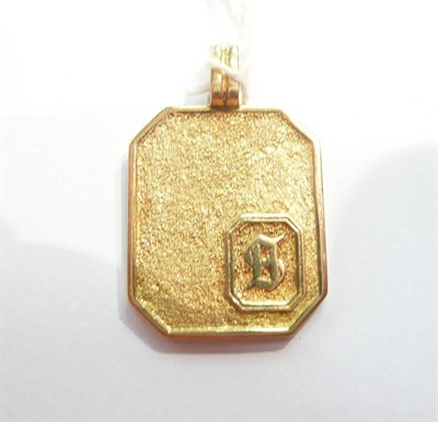 Lot 174 - A pendant stamped '750'