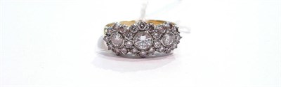 Lot 190 - An 18ct gold triple diamond cluster ring