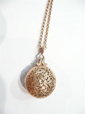 Lot 191 - A 9ct rose gold pierced locket on belcher necklet