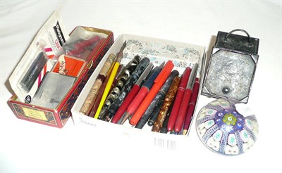 Lot 197 - A collection of fountain pens (some with gold nibs), stamp cases, glass paperweights, etc