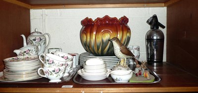 Lot 220 - A shelf including Wedgwood tea set, Spode bird, set of fish plates, soda syphon, Bretby planter etc