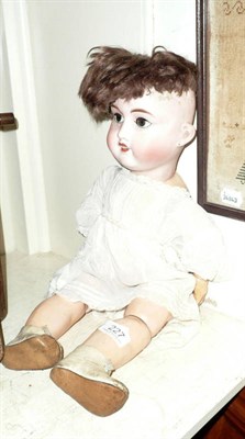 Lot 227 - French bisque socket head doll on composition jointed body