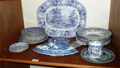Lot 233 - Quantity of blue and white pottery plates including a meat dish