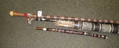 Lot 243 - Two swordsticks, a swagger stick and African arrows and quiver