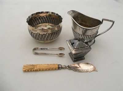 Lot 254 - Silver milk jug, silver bowl, silver sugar tongs, silver knife and a silver mustard
