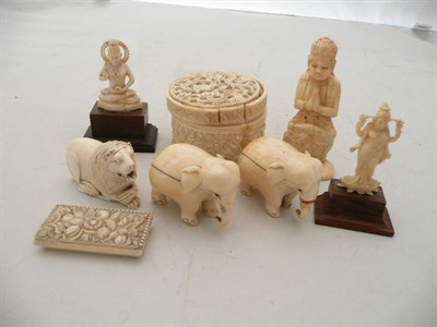 Lot 261 - Group of ivory pieces including a lion, two elephants etc, circa 1940