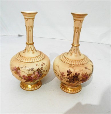 Lot 268 - A pair of Royal Worcester blush ivory vases