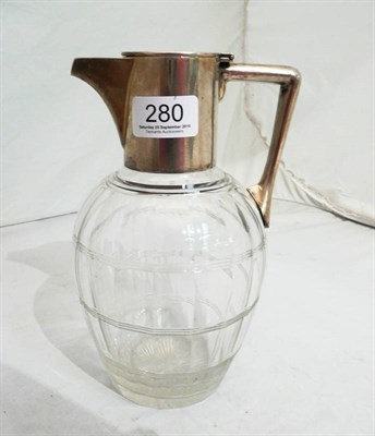 Lot 280 - Silver-mounted cut-glass claret jug