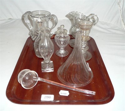 Lot 286 - Tray of eight pieces of Georgian glass including a candlestick, ladle, funnel, etc