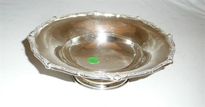 Lot 316 - A silver footed bowl with shaped Celtic border