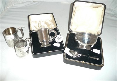 Lot 351 - Two silver christening mugs, a cased silver bowl and spoon and a cased silver mug