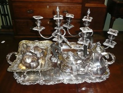 Lot 365 - Silver plate including twin handled rectangular tray, four piece tea set, pair of candelabra...