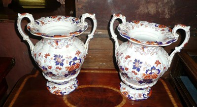 Lot 369 - Pair of stone china twin-handled pedestal vases