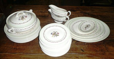 Lot 371 - A Wedgwood 'Woodland' pattern part dinner service including three graduated meat plates