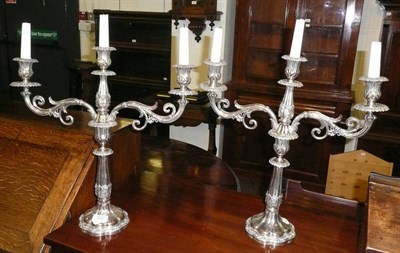 Lot 372 - Pair of silver plated candelabra