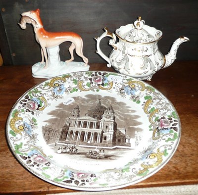 Lot 379 - Rockingham teapot, Staffordshire greyhound and a St Paul's charger