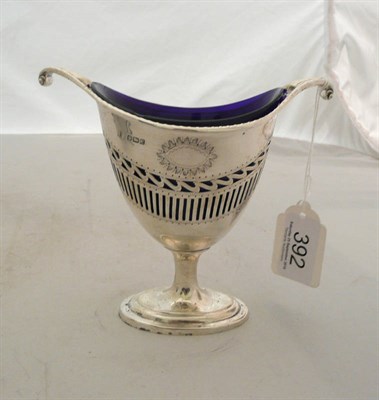 Lot 392 - An Adam style silver sugar basket with blue glass liner