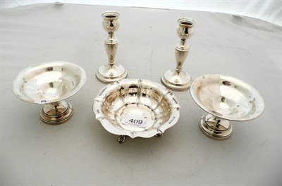 Lot 409 - A pair of small silver candlesticks, pair of small tazzae and a small footed dish