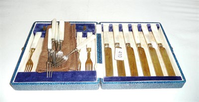 Lot 410 - A cased set of six silver gilt fruit knives and forks and a set of six mother of pearl handled...