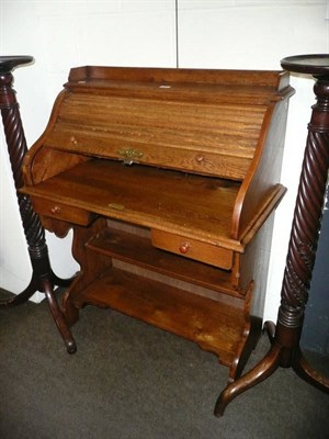 Lot 488 - A small tambour front oak bureau