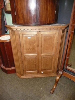 Lot 503 - Oak and pine panelled hanging corner cupboard