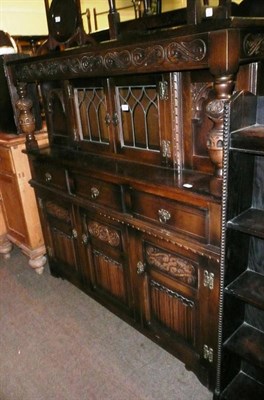 Lot 506 - Reproduction glazed oak court cupboard