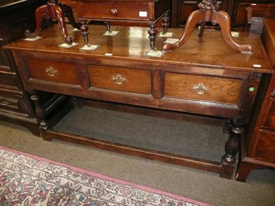 Lot 544 - 19th century oak dresser base with three drawers