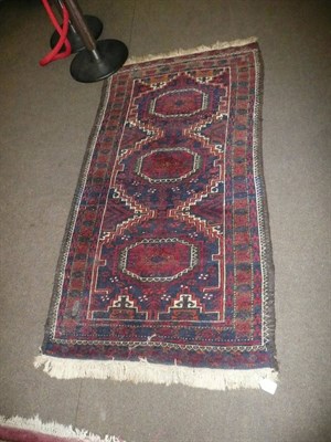 Lot 555 - An Afghan Belouch rug