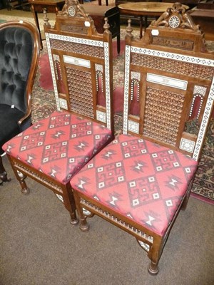 Lot 568 - Pair of inlaid 'Bugatti'-style chairs