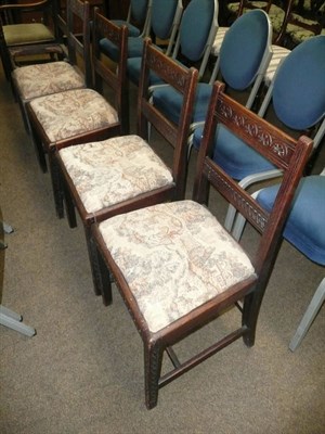 Lot 580 - A set of six (5 + 1) carved oak dining chairs