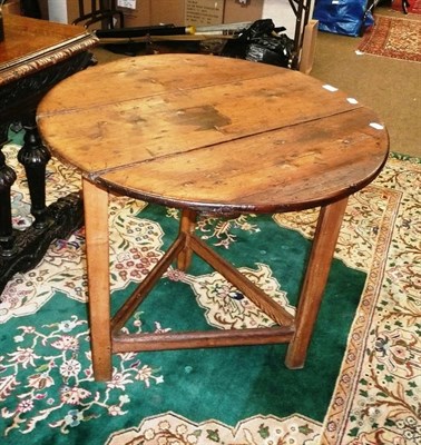 Lot 593 - Fruitwood and pine cricket table