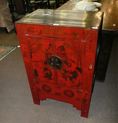 Lot 596 - Eastern red lacquered cupboard