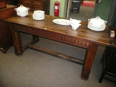 Lot 597 - An oak refectory table