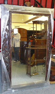 Lot 737 - Carved oak wall mirror