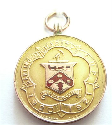 Lot 1008 - An Enamelled 9ct Gold Sporting Medal - Darlington Charity Cup 1920/1921, winners Rise Carr...