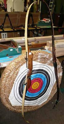 Lot 1018 - Archery Equipment, comprising two laminated wood recurve bows 'Petron' and 'Yeoman', in soft cases