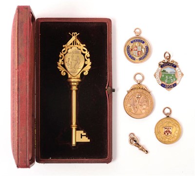 Lot 1024 - A 9ct Gold Presentation Key for Elland Cricket Club 1899, engraved with a cricket scene to one...