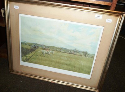 Lot 1065 - Lionel Edwards - Hunting scene, with the Master on a grey hunter after taking a hedge, colour...