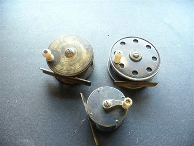 Lot 1172 - Three Early Brass Reels, comprising a 2inch winch, a 2 3/4inch platewind reel with turned bone...