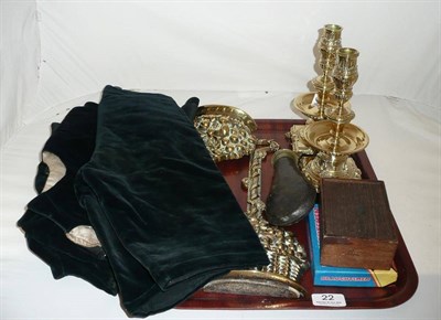 Lot 22 - A pair of brass candlesticks, a pair of brass door stops, shot flask etc and a child's velvet three