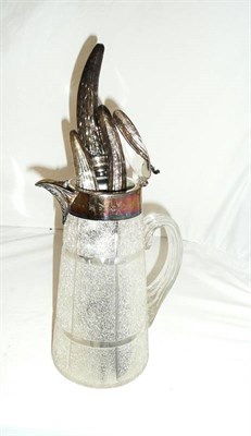Lot 32 - Victorian ice glass water jug with plated mounts and three piece silver handled carving set